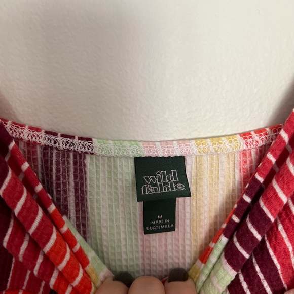 Comfy stretchy short romper. Colorful and fun. Slight cut out on the front. - Picture 2 of 4